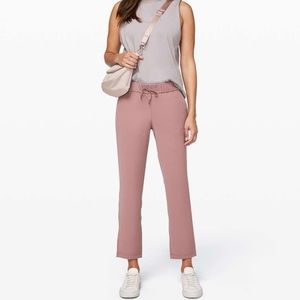 Lululemon On The Fly Woven 7/8 Pants - pink/red